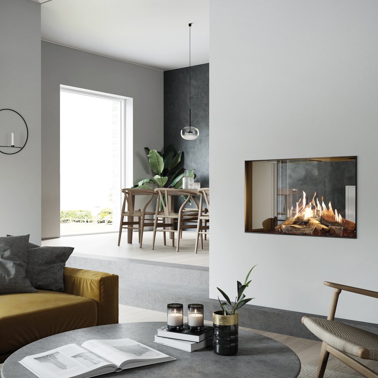 VISIO 90 T gas fireplace is located in the centre of the brightly furnished room, yet still provides a tunnel-like view from the living room to the dining room and kitchen