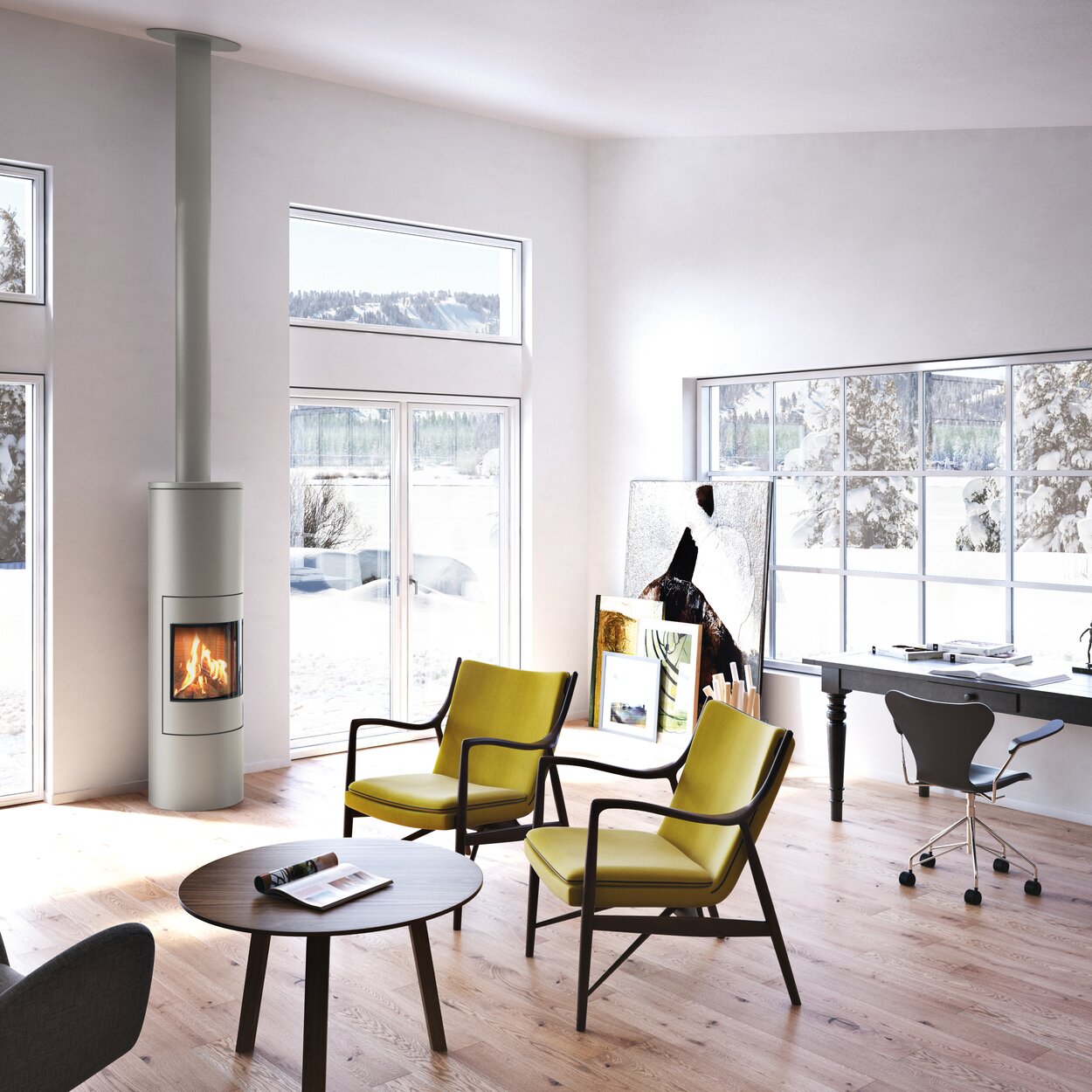 Gas stove VIVA 160 L in nickel with steel door in the office with large windows surrounded by a snow-covered winter landscape