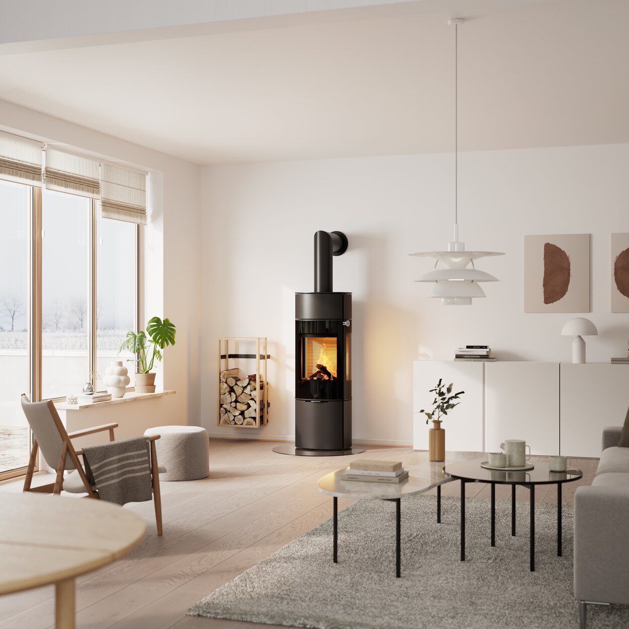 Wood stove CARO 130 in black with glass door and side window in a living room with a lot of plants