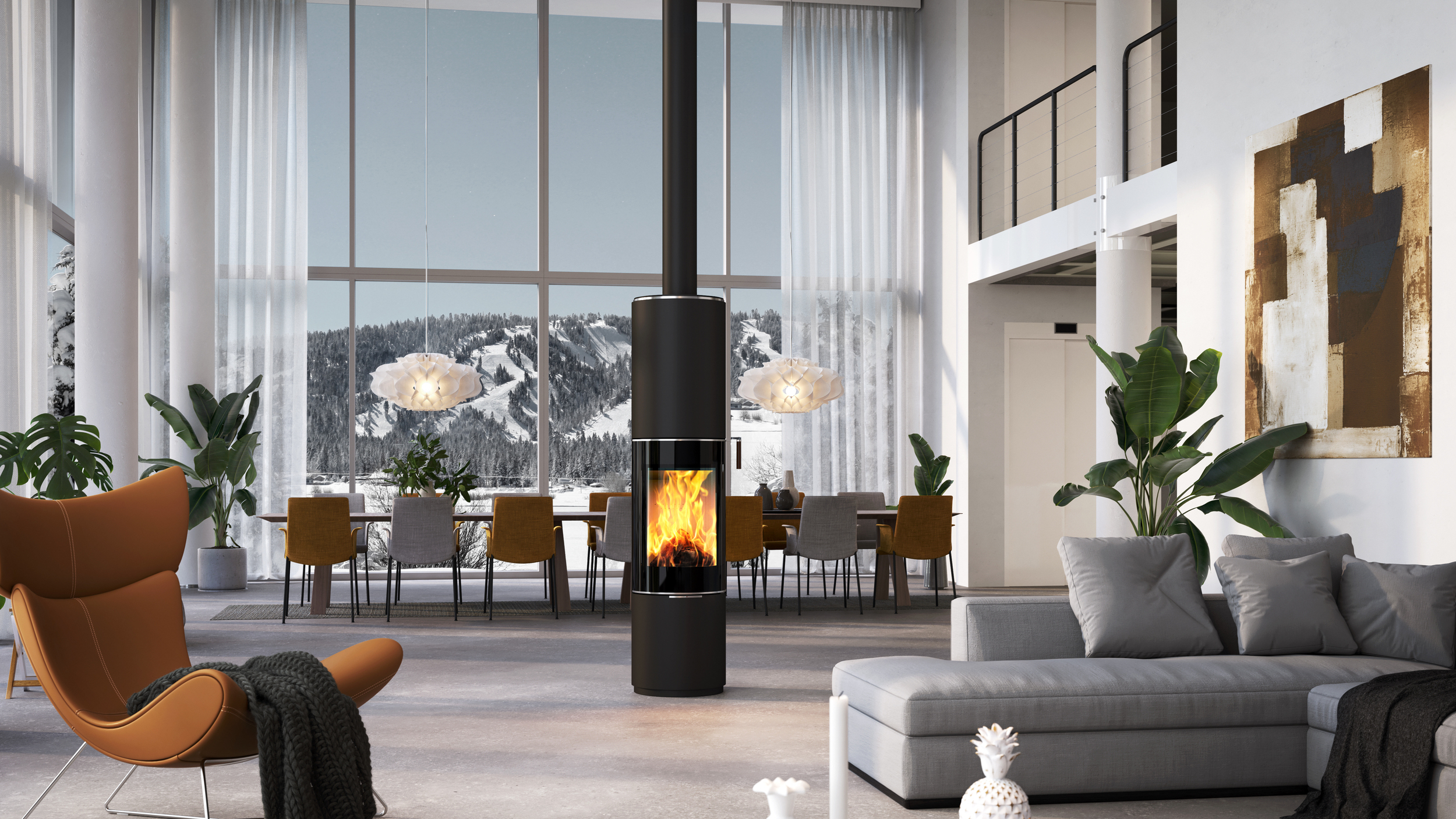 Wood stove PILAR in black with glass door as a rotating, round stove in the centre of a huge living room