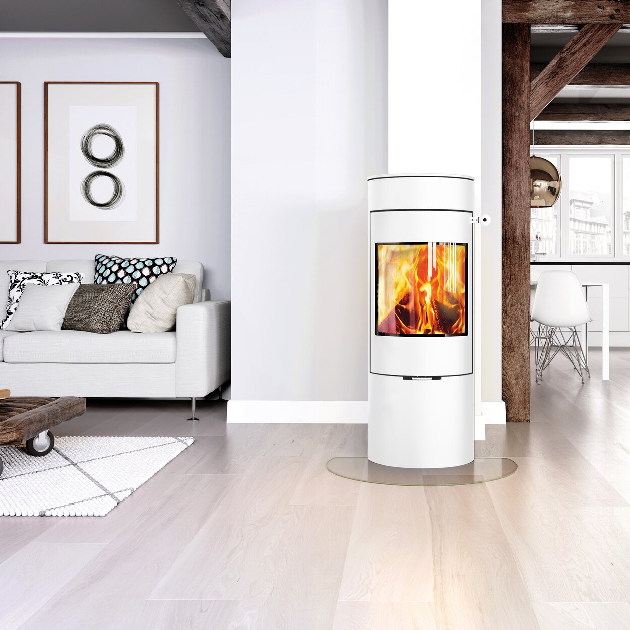 Wood stove VIVA 120 L in white with steel door in a bright, open living space