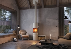 Wood stove VIVA 140 L in the colour sand with side bench in a modern flat in earth tones