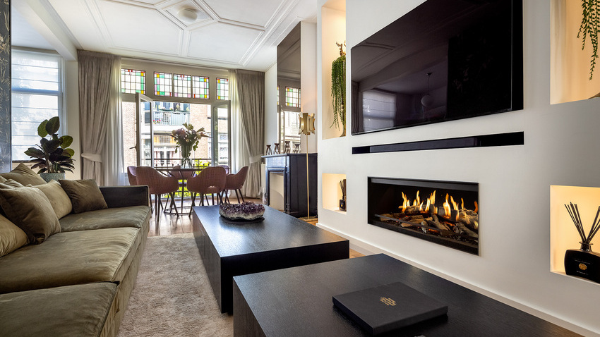The E-One 100 Front electric fireplace in a modern French-style living room.