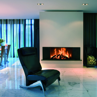 Wood fireplace W105/47F by Kalfire in front version in light-flooded living room with blue curtains