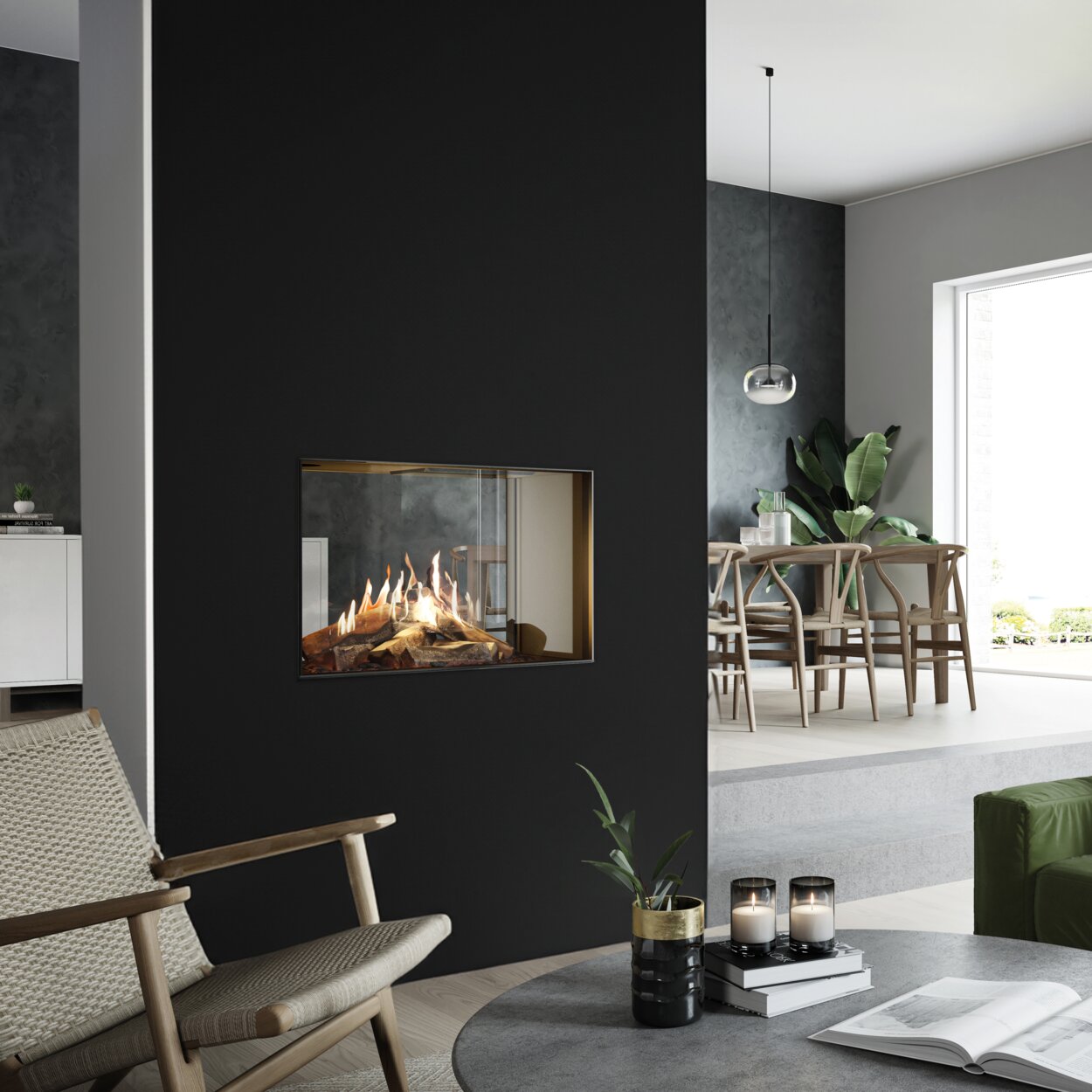 VISIO 70 T gas fireplace stands as a tunnel in a black partition wall, structuring the living space between the kitchen, dining room and living room
