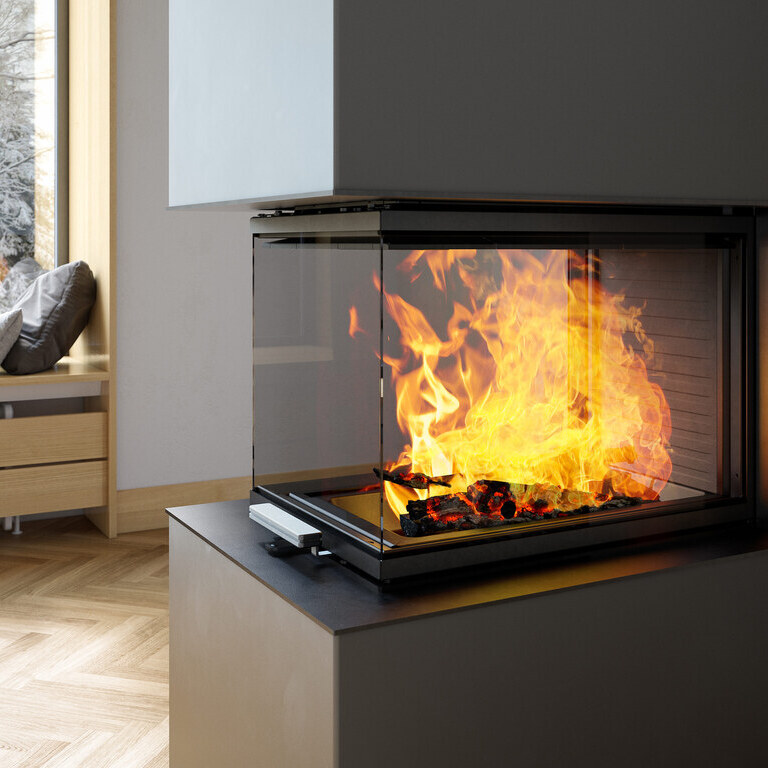 Firebox of wood fireplace VISIO 3:1 ST with view of the large flames from 3 sides