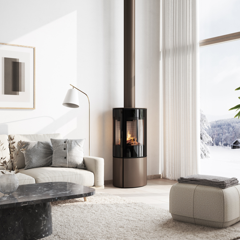 Gas stove CARO 110 in mocha with glass door and side window in a cosy living room