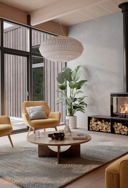 Holz-Kaminofen 600 ART im modernen Wohnzimmer mit gelben Möbeln und grosser Fensterfront