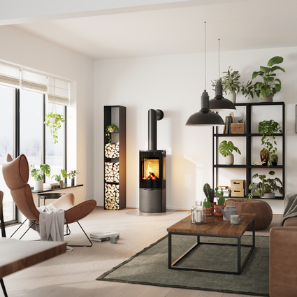 Wood stove CARO 110 in black with glass door and side window in a living room