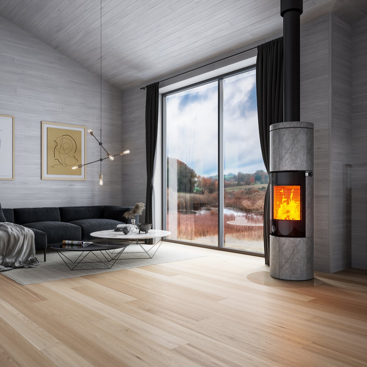 Wood stove JUNO 166 L with soapstone cladding and glass door in a large living room in grey tones