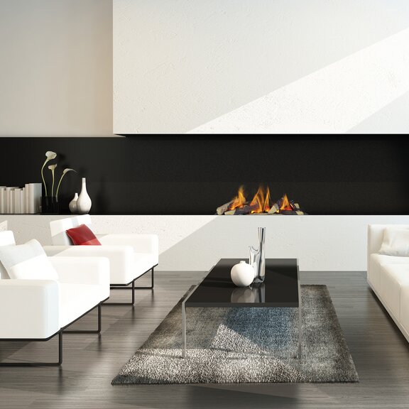 Foyer électrique Cassette 600 avec insert à bois encastré dans le mur blanc d'un salon moderne