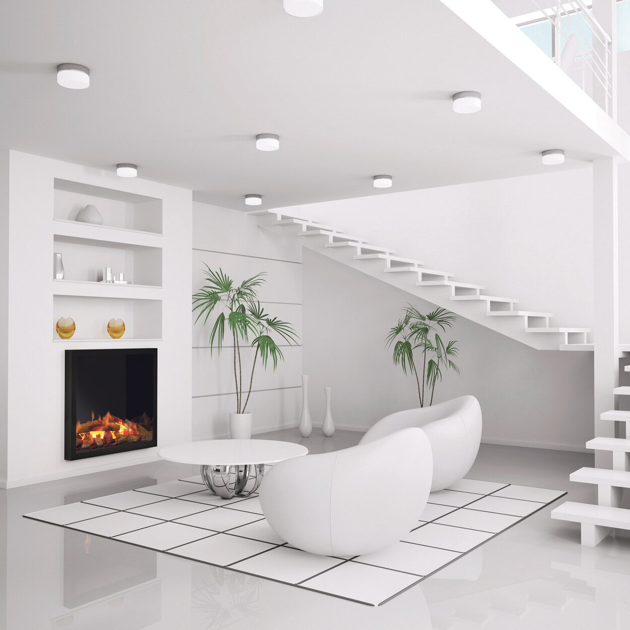 Feu électrique Juneau dans le salon blanc avec escalier et meubles blancs