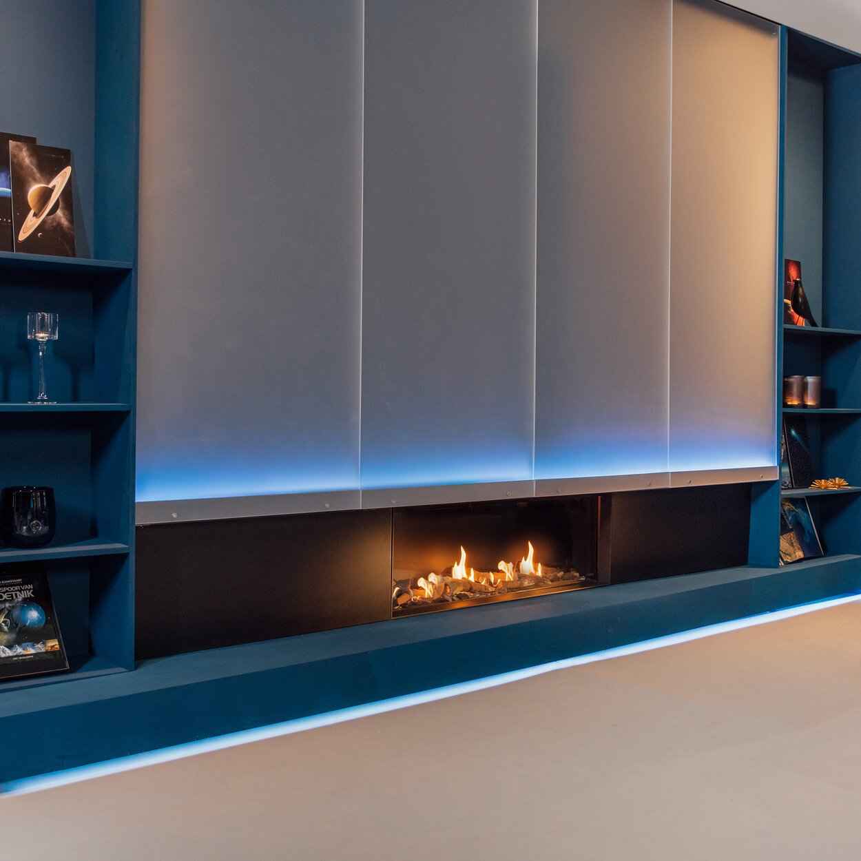 MatriX Linear 1300/400 front gas fireplace installed in the blue sideboard in the living room