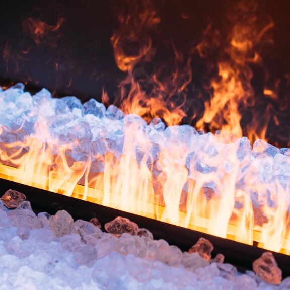 Electric fireplace e-Matrix Mood 800/500 front version with pebbles around the flames as decoration