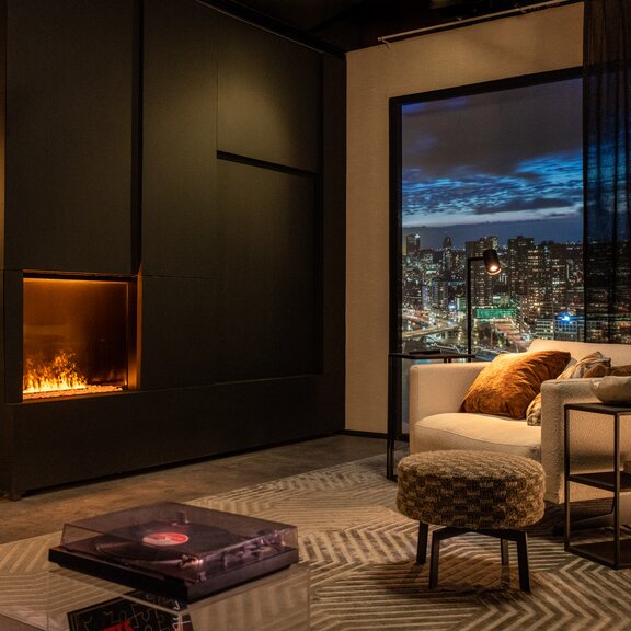 Electric fireplace e-Matrix Mood 800/650 front version in a simple city flat with dark panelling