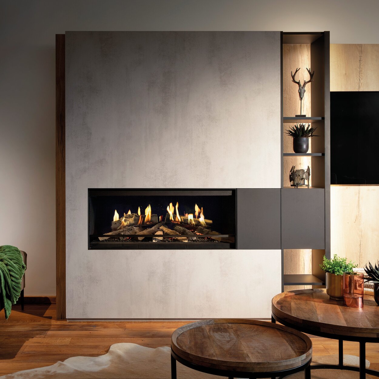 The E-One 100 electric fireplace front in the living room built into a concrete element.