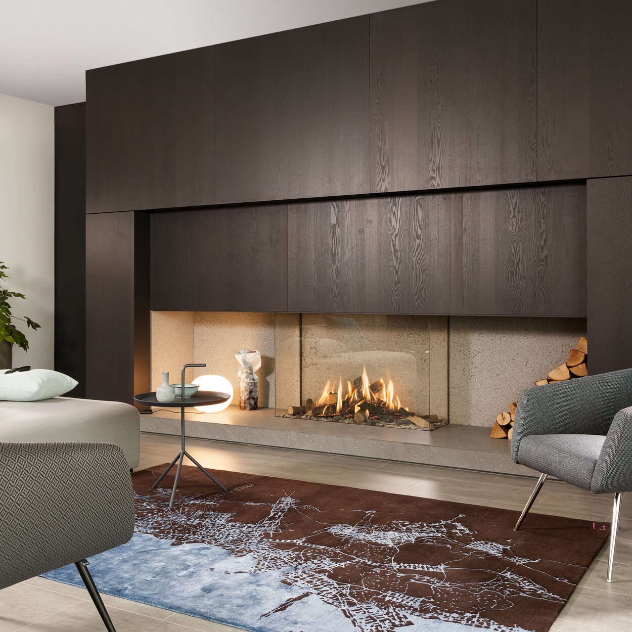 Gas fireplace GP115/75S glazed on 3-sided on modern dark wooden wall installed in living room with sofa and armchair