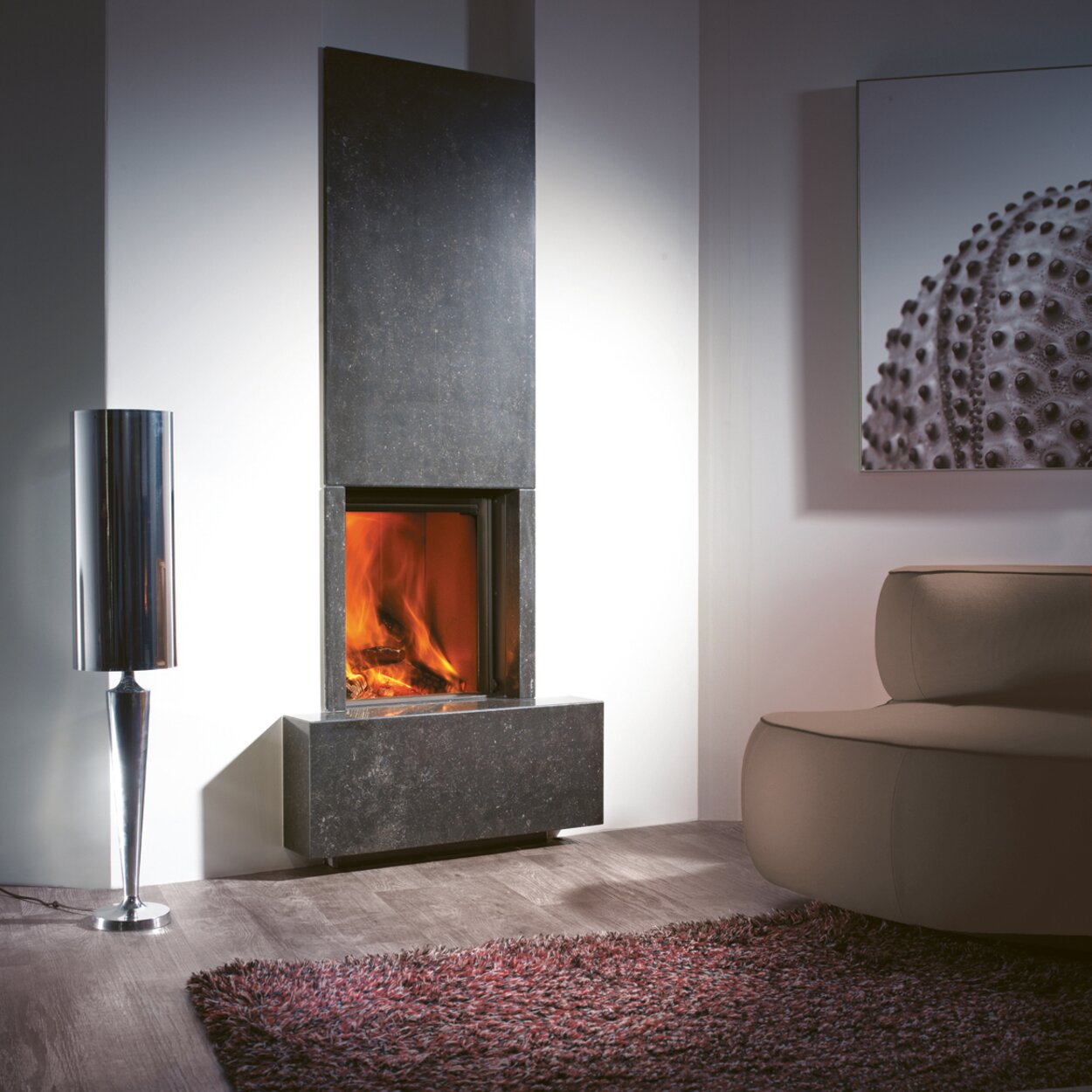 Wood fireplace W45/48F by Kalfire in front version as a compact fireplace built into a stone front